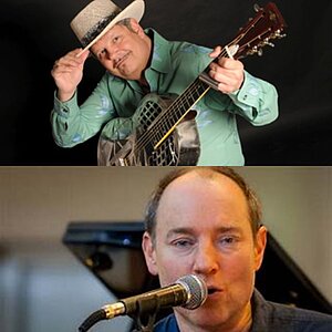 Erik Trauner mit Gitarre und Henry Heggen am Mikrofon